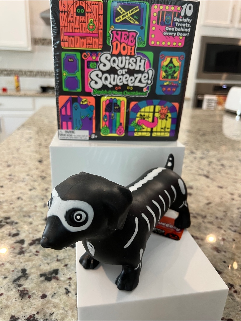 Needoh squish or squeeeze and squeeezy skeleton dog